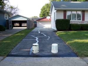 Picture of asphalt driveway sealer applied by Waddill Services, LLC in Des Moines, Iowa 1