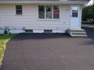 Picture of asphalt driveway sealer applied by Waddill Services, LLC in Des Moines, Iowa 5