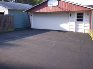 Picture of asphalt driveway sealer applied by Waddill Services, LLC in Des Moines, Iowa 6