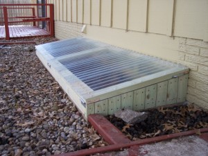 Picture of custom window well cover constructed by Waddill Services, LLC in Des Moines, Iowa 1